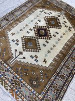 Full view of rug showing design and colors