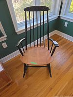 Front view of two-tone Windsor rocking chair