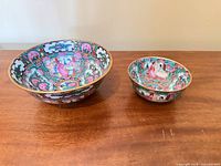 Top view of both bowls showing interior decoration and relative sizes