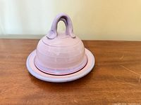 Butter dish assembled showing dome lid on plate