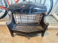 Front view showing complete fireplace heater and details