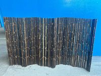 Full view of rolled-out bamboo fence