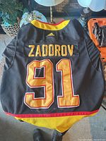 Back view showing Zadorov name, number 91, Adidas logo