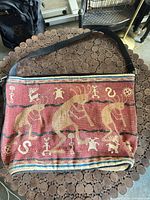 Front view showing full tapestry pattern and strap