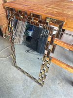 Full view of mirror showing rectangular glass-tile frame and overall size