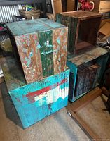Stacked view of four distressed multicolour wood cube tables