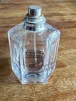 Front view of Gucci Flora Gorgeous Gardenia perfume bottle showing label and liquid level