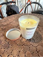 Front view of the Lavender Cedarwood candle showing label, wax, wick and lid