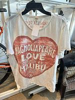 Front view showing heart graphic and overall color