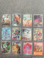 Overview of all twelve Japanese Pokémon cards in sleeves