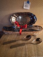 Overview showing platter, basket, salad servers