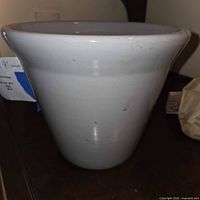 Side view of gray ceramic planter