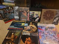 Group shot of all nine hardcover art books