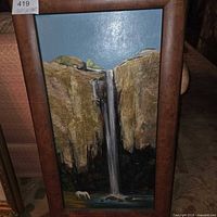 Front view of framed painting showing artwork and frame