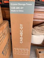 Factory-sealed carton labeled CAB-4BC-GY Drawer Storage Tower