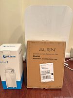 Group shot showing Alen BreatheSmart FLEX purifier, boxed Alen FL40-H filter, and boxed Airfree T purifier