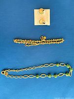 Full view of necklace, bracelet and earrings together