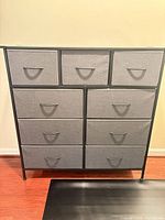 Front view showing nine drawers configuration