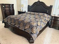 Full view of bed frame with mattress in room