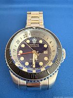 Front view of Invicta Hydromax Pro Diver watch showing dial, bezel, bracelet