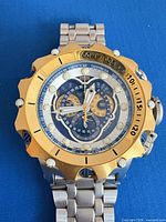 Front view showing dial, bezel, and bracelet