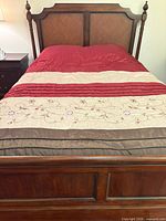 Full view of bed frame showing headboard and footboard