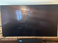 Front view of Samsung 65-inch TV powered off