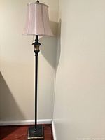 Full view of lamp showing entire height, shade, base