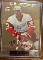 Front of 2005-06 Fleer Ultra Johan Franzen rookie card in sleeve
