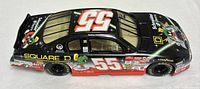 Left side view of diecast car showing 55 number, Square D logo, sponsor decals