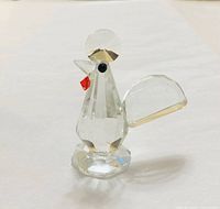 Front angled view showing full crystal rooster figurine on white background