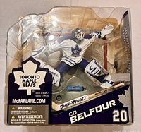Front of sealed blister pack showing Ed Belfour figure and accessories