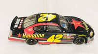 Left side view showing #42 graphics and Havoline sponsor