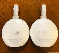 Front view of both NEIGES bottles