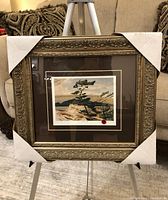 Front view of framed print with protective corner covers