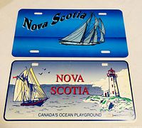 Both Nova Scotia novelty license plates showing front graphics