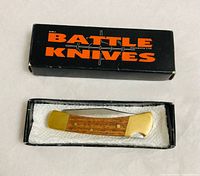 Knife in open "Battle Knives" box with foam insert