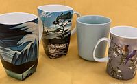 Four mugs front view