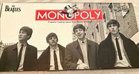Front of Beatles Monopoly Collector's Edition box featuring Beatles photo and logo