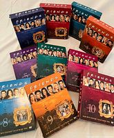 Front view of all ten Friends season slipcases