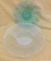 Both glass plates shown together, clear plate front and green plate rear