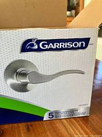 Retail box showing Garrison branding and lever image