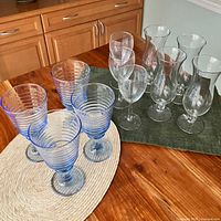 Group of all 11 glasses on table
