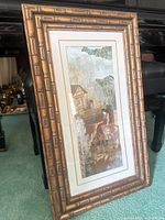 Front view of framed Asian motif art print showing frame style and matting