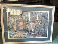 Framed print full view showing white distressed frame, double mat and garden scene