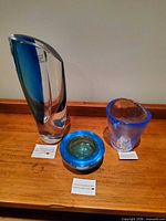 All three glass pieces on tray showing relative size and color
