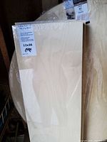 12×36-inch raw birch Apollon panel still in shrink wrap showing label
