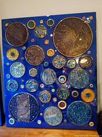 Full view of the rectangular panel showing all raised circular elements