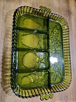 Indiana Glass green divided relish dish top view showing fruit motif