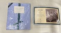 Sealed Laura Ashley duvet cover and sheet set side by side